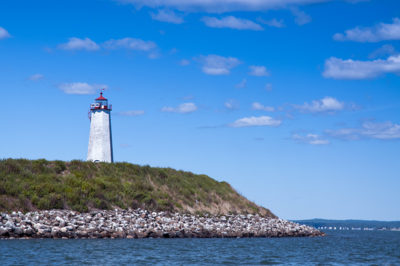 Faulkner's Island Lighthouse by Rocky Shore