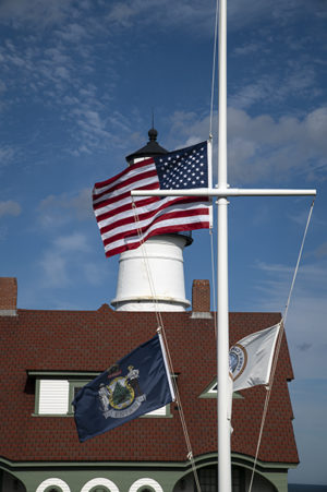 Flag at half mast on 9-11 at Portland Head Lighthouse in Maine