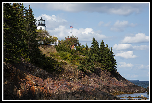 Owls Head Lighthouse Over Huge Cliffs in Maine