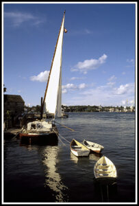 Gundalow barge boat with sail in Portsmouth Harbor.