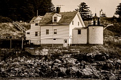 Browns Head Light Over Rocky Shore in Maine -BW