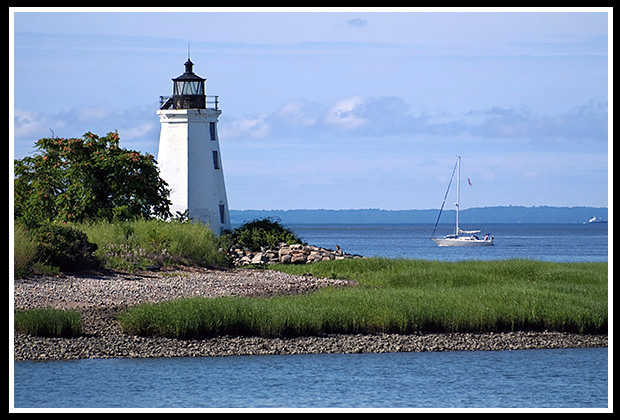 sailboat by Black Rock Harbor light