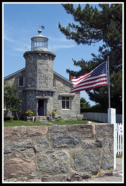 American flag by Stonington Harbor light