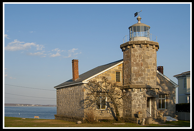 Stonington Harbor light as sun sets  