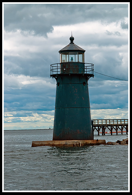 unique black tower of Tongue Point lighthouse