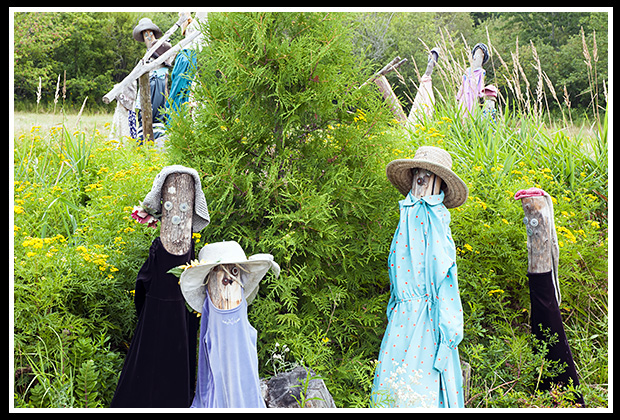 log people wooden sculptures