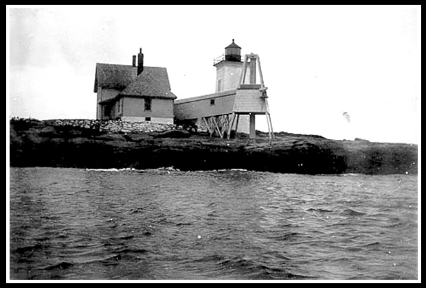 early Henricks Head light with fog bell tower