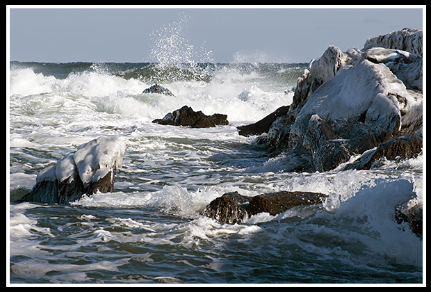 ice and snow on rocky shore