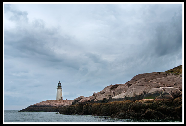 clouds swirl over Moose Peak lighthouse