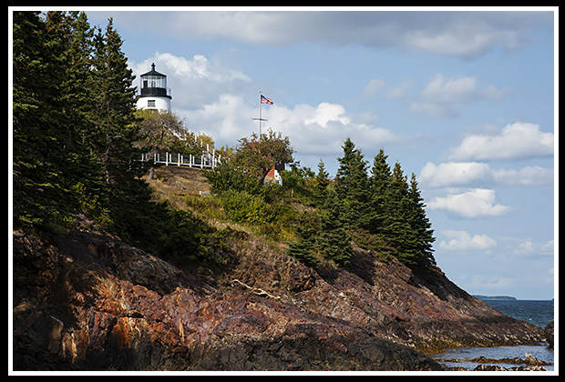 Owls Head lighthouse above cliffs