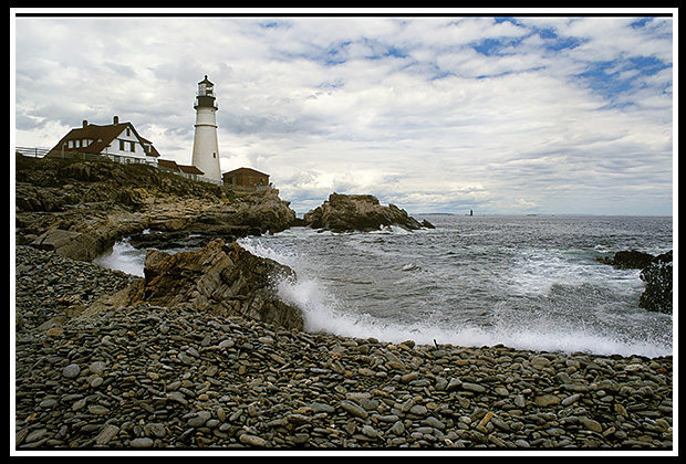 Portland Head light along rocky shore