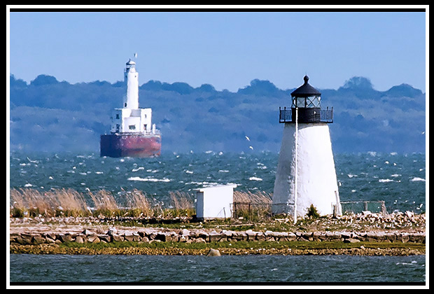 view of both lighthouses from road to golf course