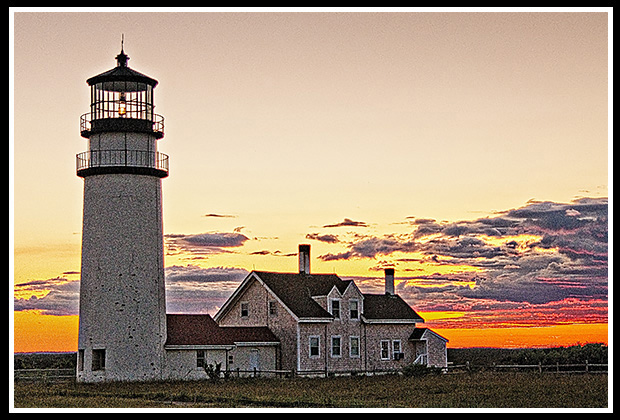 sunset by cape cod light