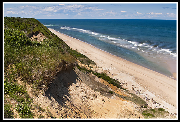 beach below huge cliffs on cape cod seashore