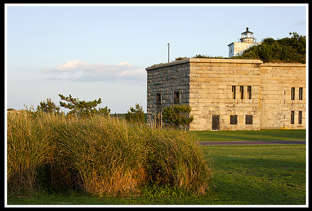 sunset at Clark's Point light in New Bedford, MA