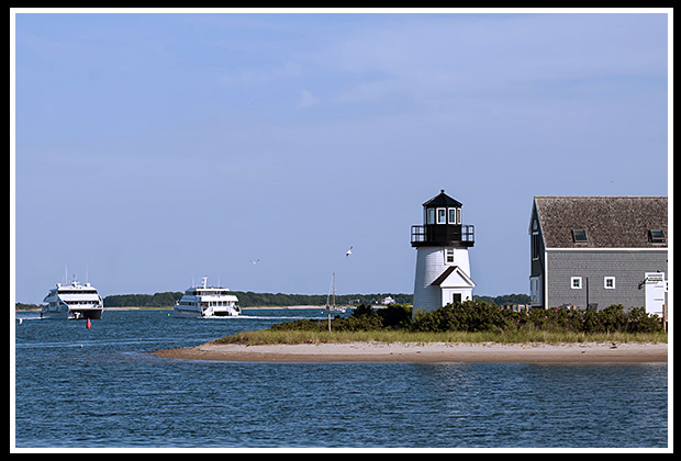 Hyannis Harbor light guides ferries