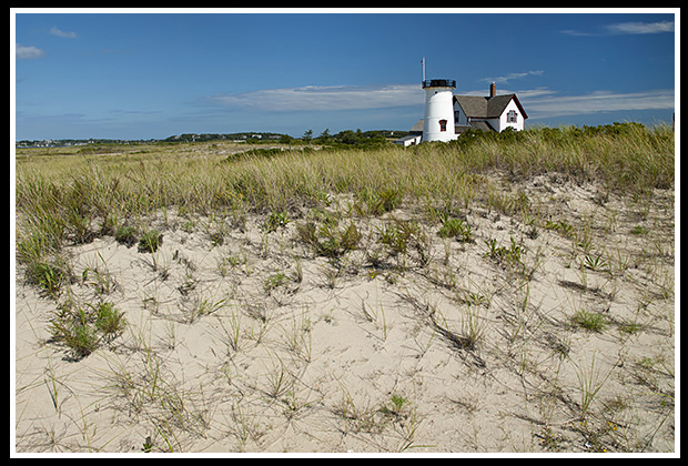 sandy path to Stage Harbor light