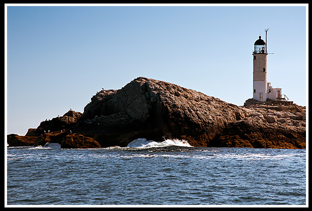 Isles of Shoals (White Island) light overlooking rocky shore