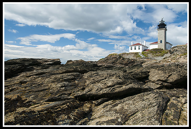 Beavertail lighthouse among rock formations