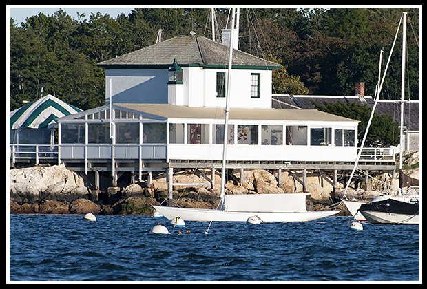 tiny Ida Lewis lighthouse sits atop yaucht club building