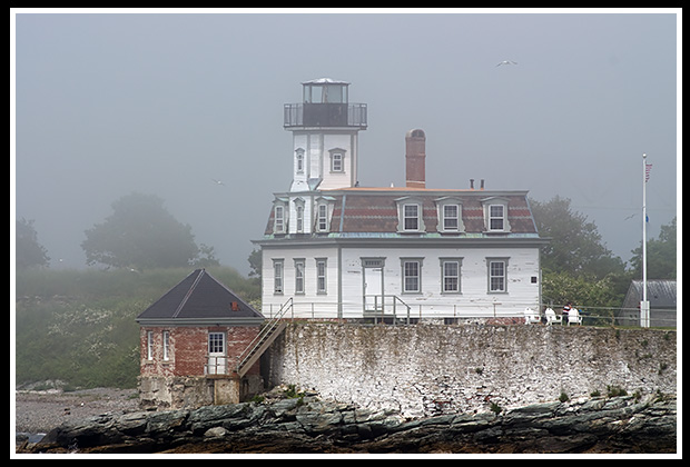 Newport Harbor lighthouse in a small park