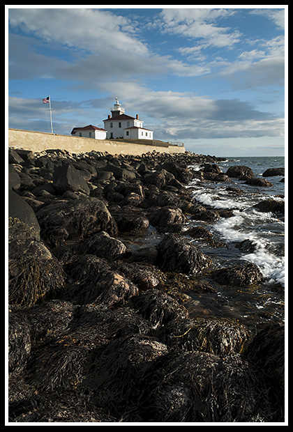 Watch Hill lighthouse at low tide